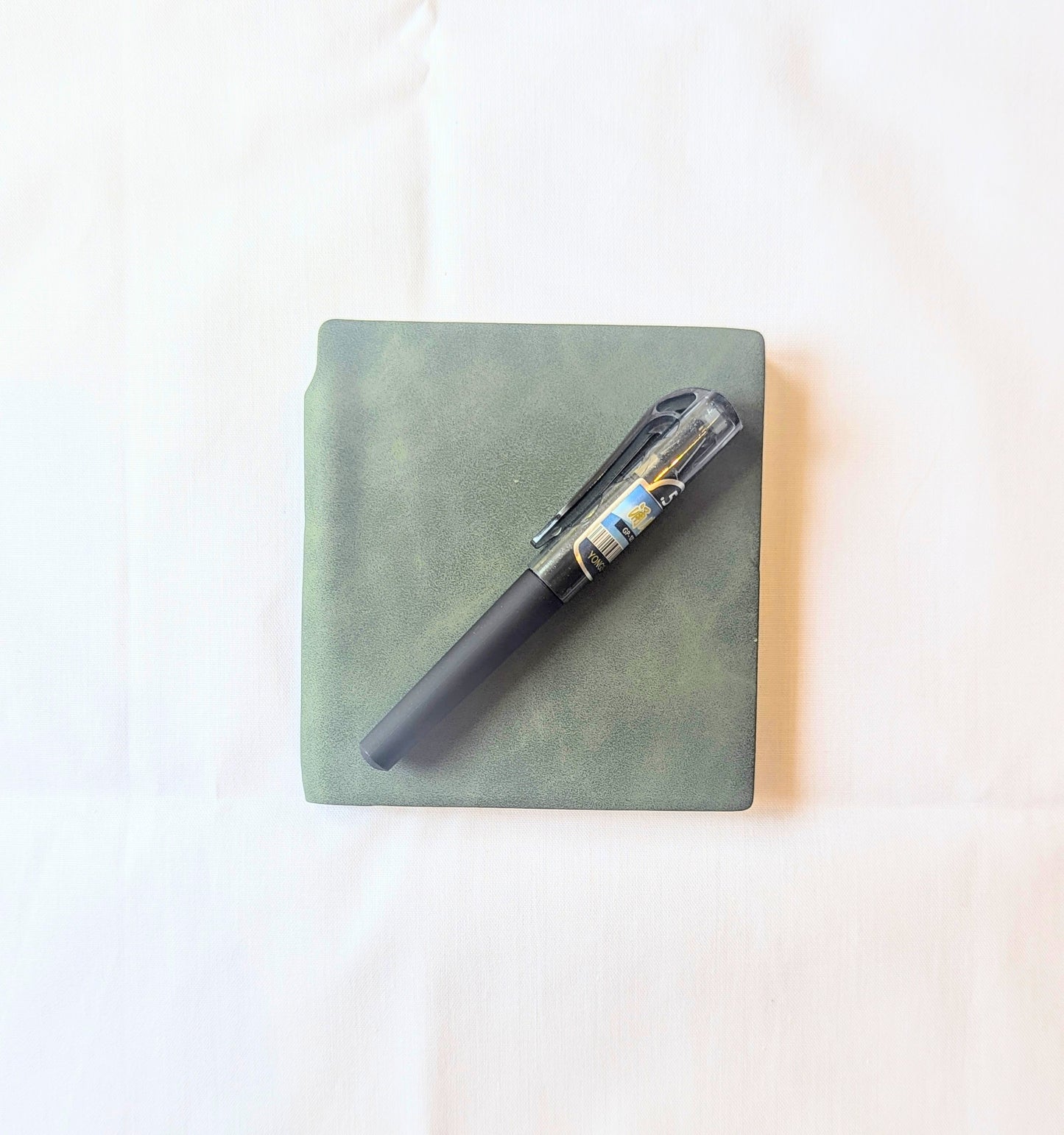 Notebook and Pen