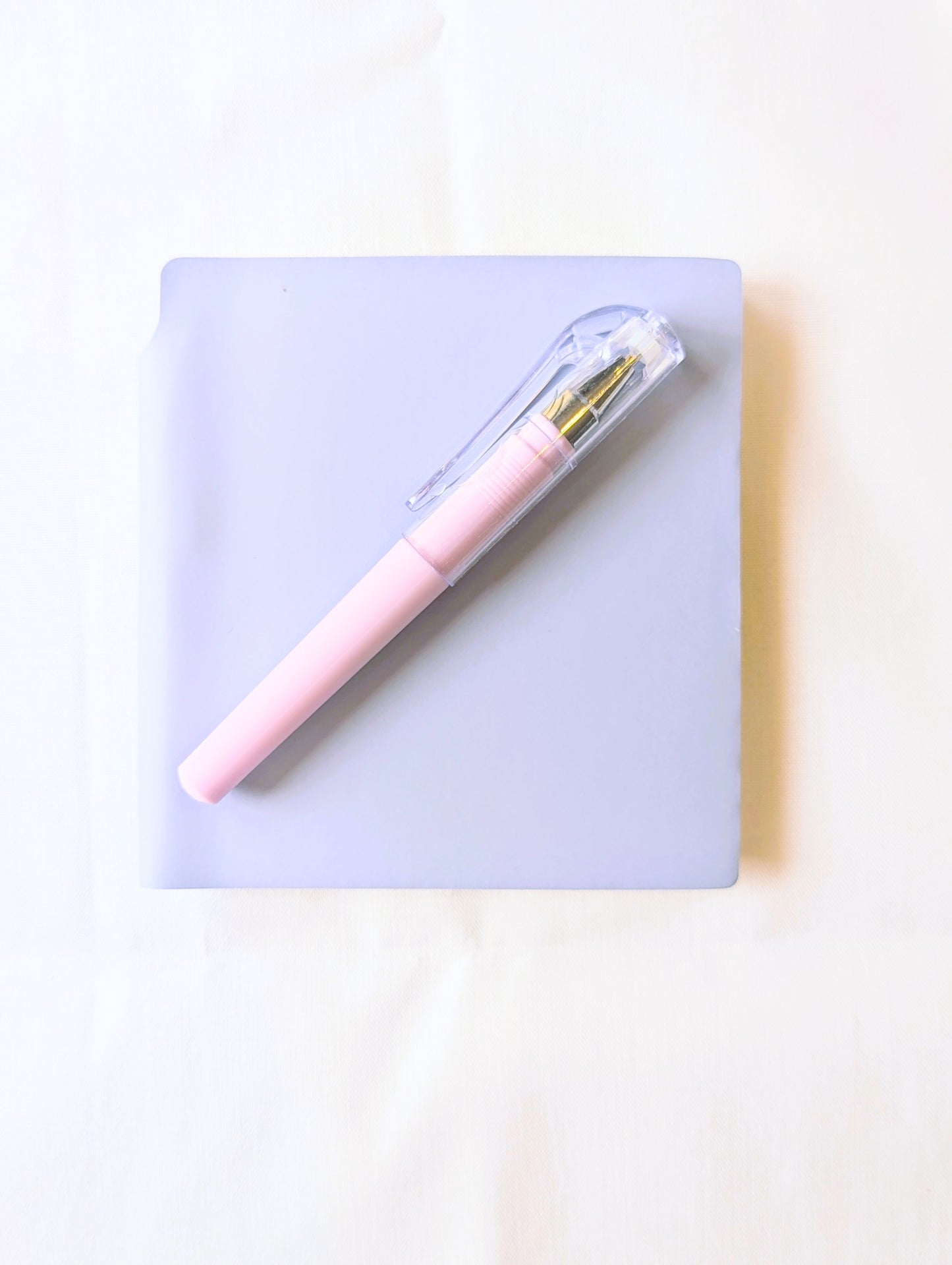 Notebook and Pen